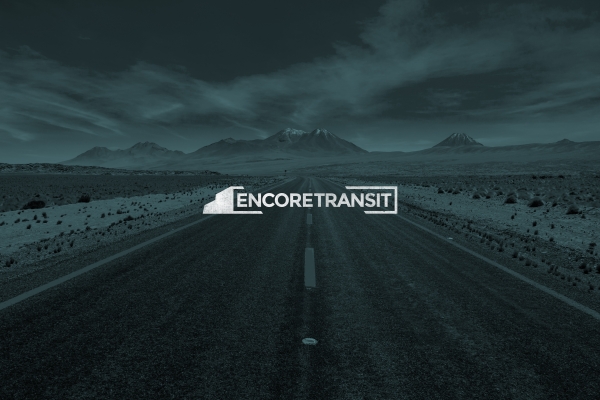 Encore Transit white logo design on dark blue photo background