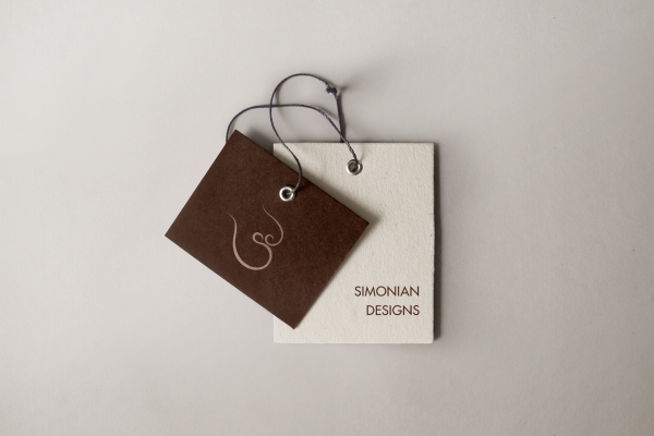 Branded product tags with logo and wordmark